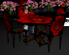 mesa con sillas de rosas