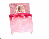 Swaddled Baby in Bouncer