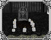 grave stone w/ candles