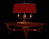 Red lamp on wood table