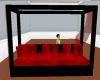 Red and Black Canopy Bed
