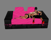 pink & blk couch w/poses