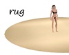 UC golden round rug
