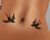 *Z* Swallow belly tattoo