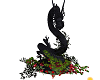dragon statue w flowers