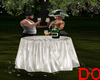 COUPLE TOASTING TABLE