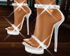 [i] Elegant white shoes