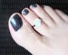 dainty feet black nails
