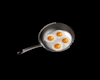 Frying pan with eggs