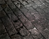 wet cobblestone floor