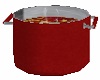 red pot with soup