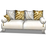 gold and white loveseat