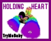 HOLDING HEART