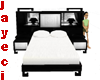 ]J[ exotic blk wh bed