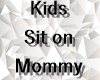 Kids Sit On Mommy