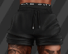 B. Tucked Shorts Black.