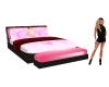 Poseless pink-black bed