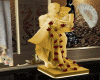 estatua nivios dorada